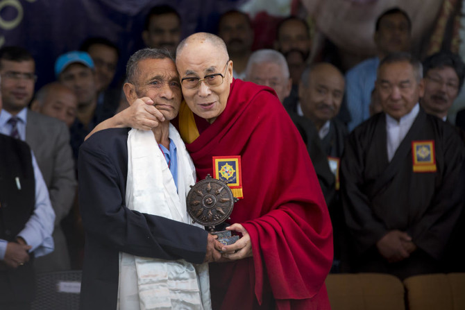 Dalai Lama calls on Tibetans to remain united as India drifts toward China