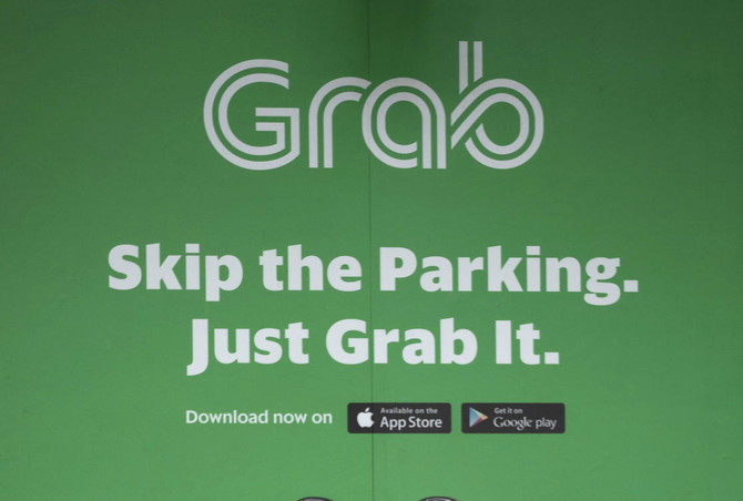 Malaysia puts Grab on anti-competition watchlist after Uber stake 