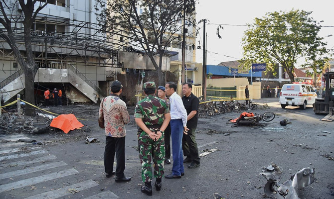 2 militants on motorcycle blow themselves up at Indonesian police HQ ...