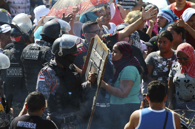 Manhunt in Brazil for 184 escaped inmates after deadly prison riot