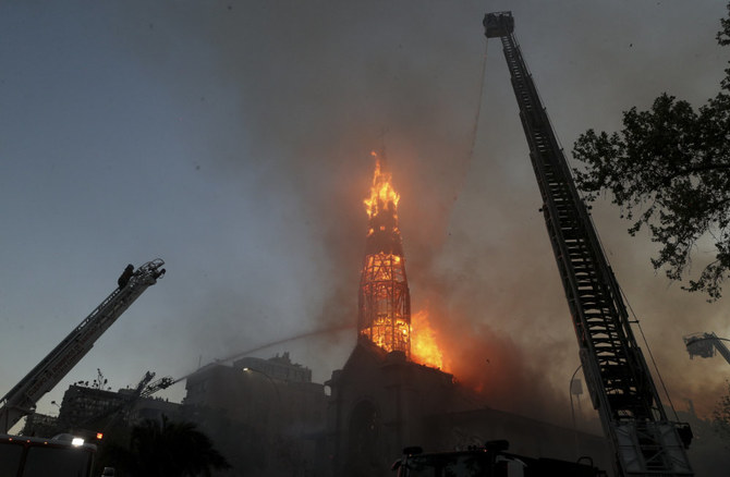 Chile anniversary rallies turn violent as churches burned, police fire tear  gas | Arab News