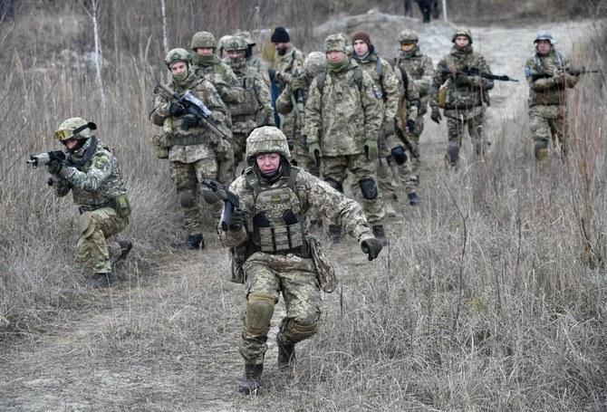 Ukraine officials shelled on eastern front as separatists go on full ...