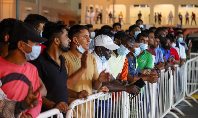 Qatar's migrant labourers queue to catch a glimpse of World Cup trophy- The  New Indian Express