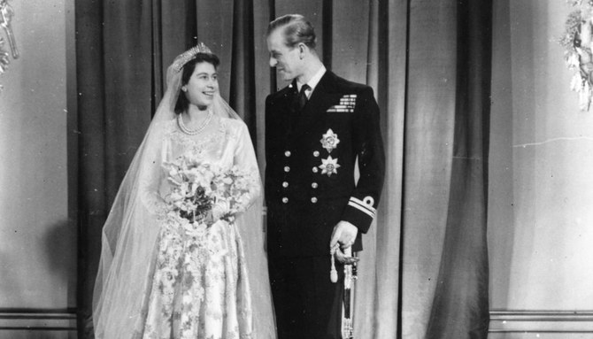 Looking back at Queen Elizabeth II s wedding gown made with Syrian