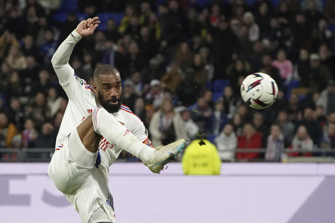 Lacazette helps Lyon push for European spot as he battles