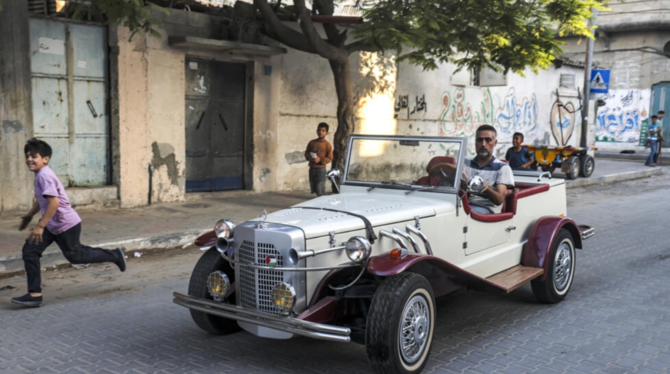 Classic cars back on the road in Gaza City Arab News