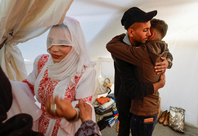 We will celebrate amidst destruction': Young couple marries in Gaza camp, Israel War on Gaza