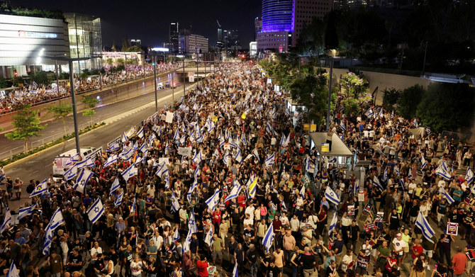 People attend a demonstration against Israeli Prime Minister Benjamin Netanyahu's government and a call for the release of hostages in Gaza, amid the Israel-Hamas conflict, in Tel Aviv, Israel, June 22, 2024. (REUTERS)