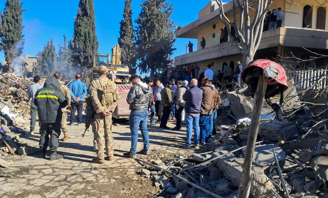 Workers Search Through Rubble In Eastern Lebanon Where Israeli Strike ...