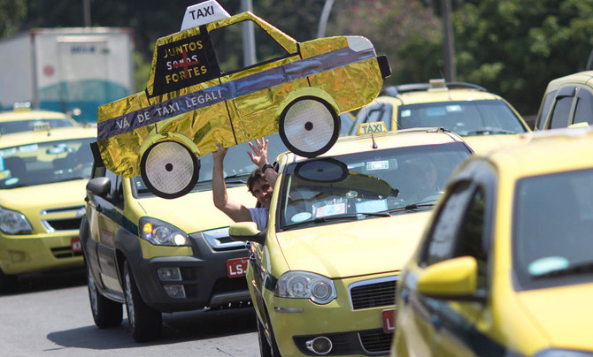 Uber looks to dominate Brazil while taxis push to ban app  Arab News