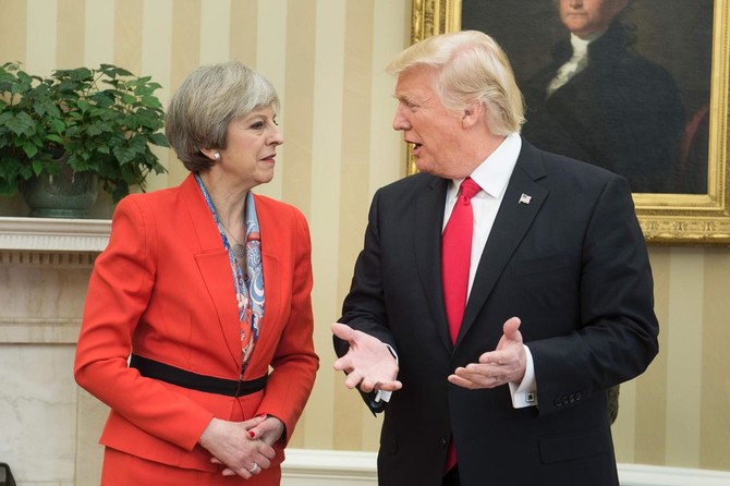 Trump hosts first foreign leader as May visits White House