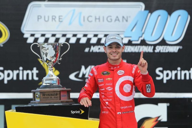 Larson takes advantage of late restart for first Cup victory