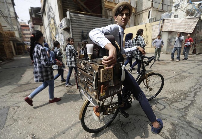 Beirut’s dapper barber-on-a-bike offers curbside cuts