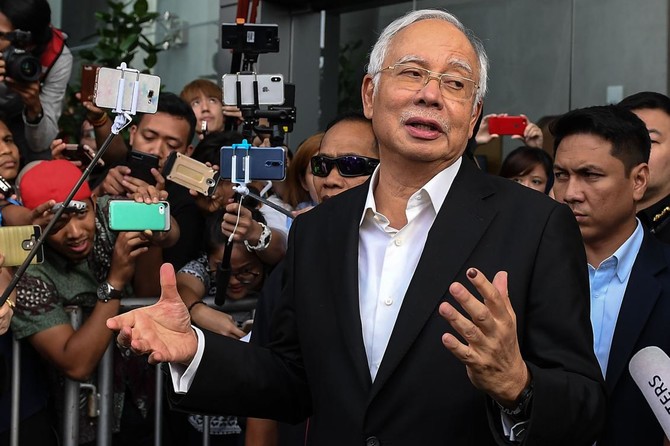 Malaysia seeks to lay multiple charges against ex-premier Najib over 1MDB