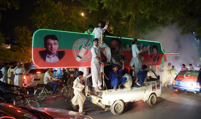 Pakistan’s incumbent party rejects ‘rigged’ election result as Imran Khan takes lead