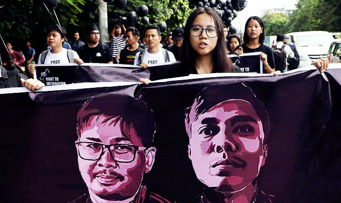 Myanmar Court Sentences Reuters Reporters To 7 Years In Jail | Arab News