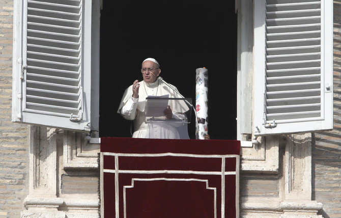 Pope lights candle to promote peace in Syria