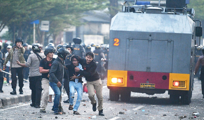 Protesters Clash With Indonesian Police After Election Loss | Arab News