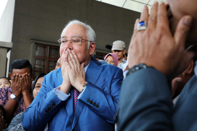 Malaysian ex-leader Najib takes stand in 1MDB trial