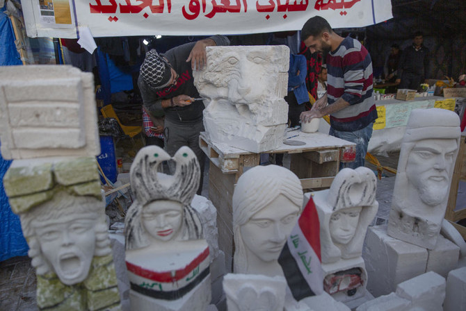 Iraqi artists pay tribute to dead protesters with sculptures