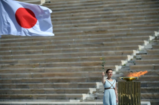 Olympics-Tokyo 2020 Games organizers receive Olympic flame