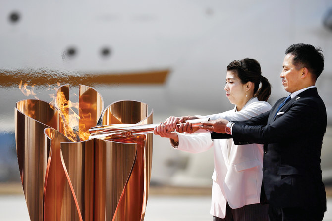 Crowds form at Olympic torch event in Japan despite virus caution