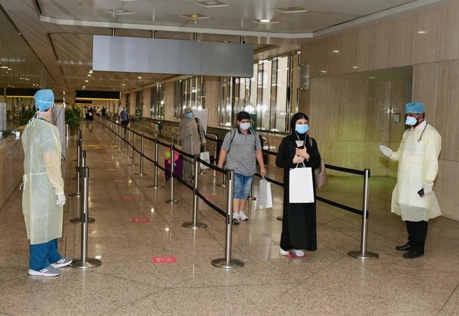 Saudi citizens arrive in Dammam on coronavirus evacuation flight from Malaysia