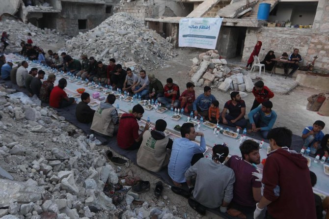 Amid ruins of a Syrian town, Ramadan meal reunites a community