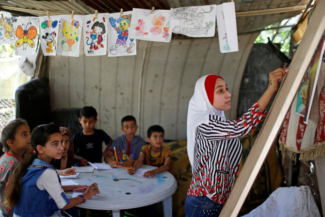 Gaza girl, 13, teaches neighborhood children during school closure