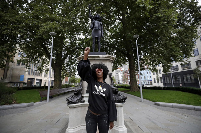 Toppled slave trader’s statue replaced by Black protester in England