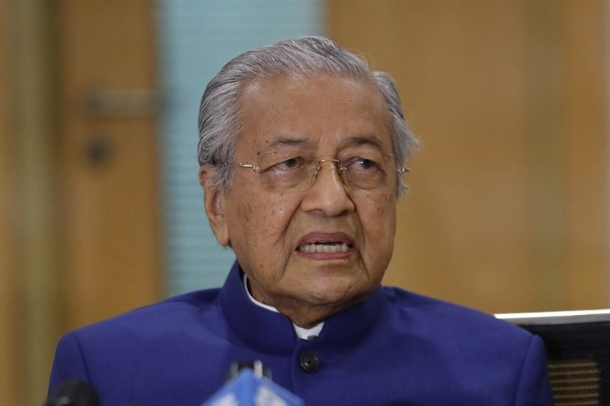 Malaysia’s Mahathir Says Political Uncertainty Won’t End With Anwar As ...