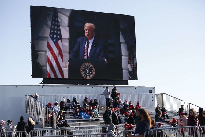 Trump dismisses ‘fake’ polls, Biden says time to end the ‘chaos’