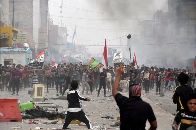 Four dead as rival protesters clash in southern Iraq