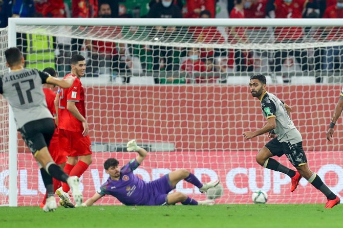 Al-Ahly's midfielder Hussein El-Shahat (R) runs after scoring during the FIFA Club World Cup second round match between Qatar's Al-Duhail and Egypt's Al-Ahly at the Education City Stadium in the Qatari city of Ar-Rayyan on February 4, 2021. (AFP)