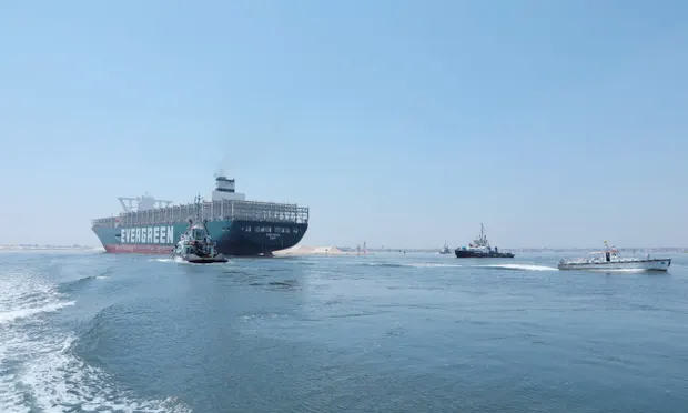 The Ever Given sails through the Suez Canal in Ismailia, Egypt. (Reuters)