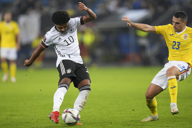 Germany beats Romania to continue winning start under Flick