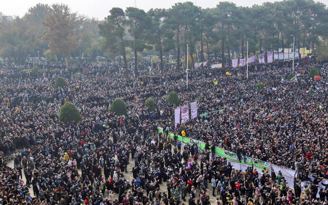 In this file photo taken on November 19, 2021, Iranians gather during a protest to voice their anger after their province's lifeblood river dried up due to drought and diversion, in the central city of Isfahan. (AFP)