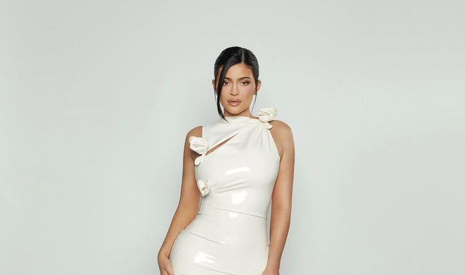 Kylie Jenner wears mini dress and SLIPPERS for Skin launch