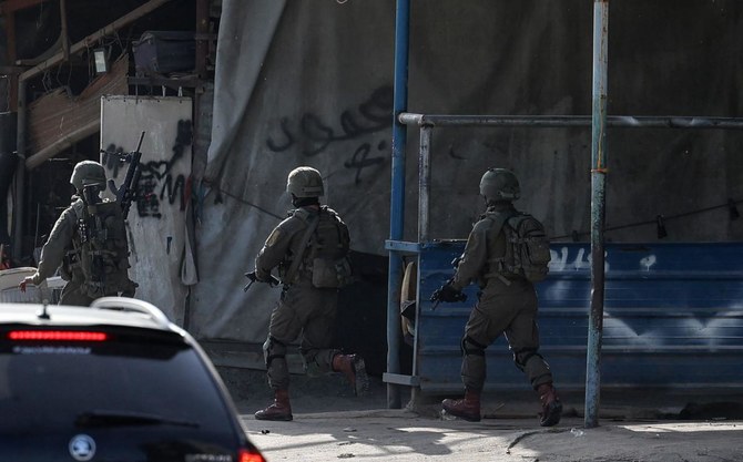 Israel army raids West Bank town Tel Aviv gunmen hailed from