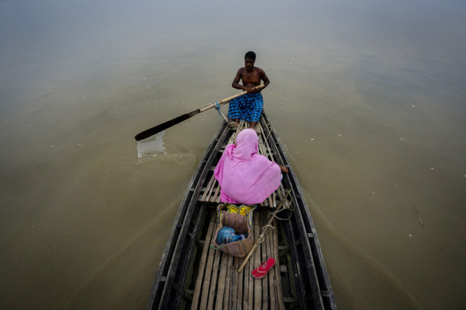 Without land, Bangladesh’s Manta people live — and die — on boats