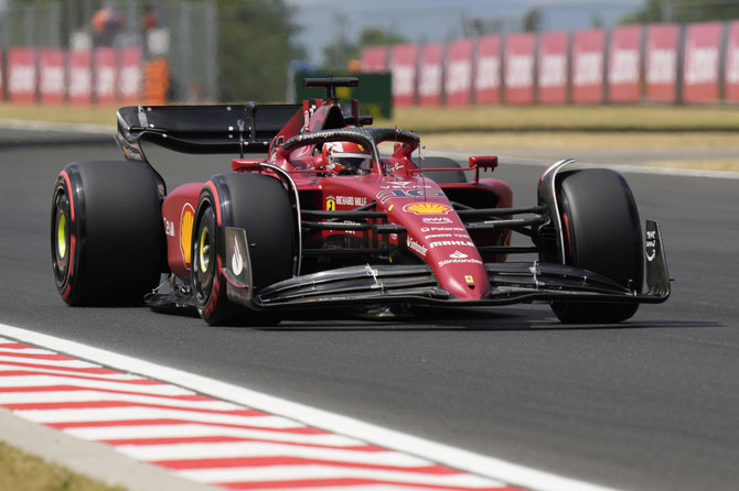 F1 drivers navigate rain-drenched practice before qualifying