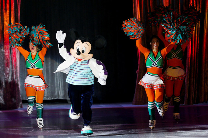 A Performer dressed as Walt Disney's animated cartoon character Mickey Mouse, performs during Disney On Ice festival in Riyadh