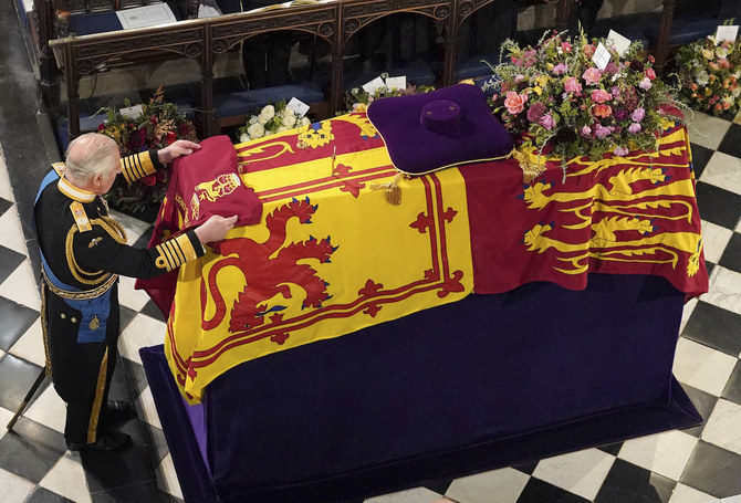 Queen Elizabeth’s coffin lowered into vault ahead of private burial