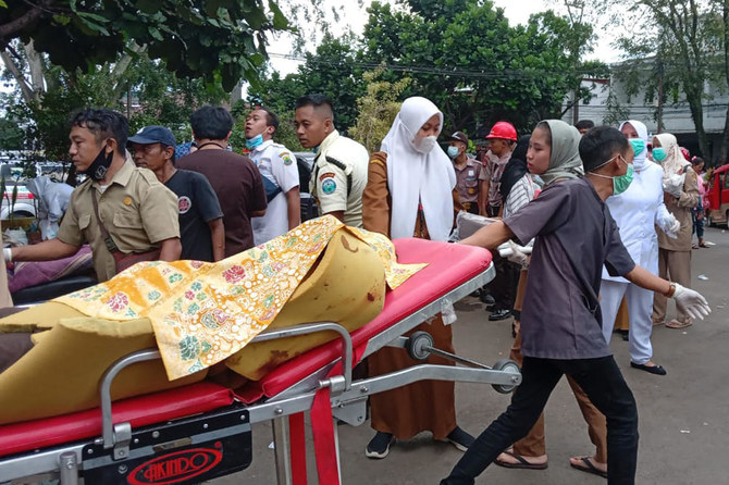 Hunt for buried survivors after Indonesia quake kills 162