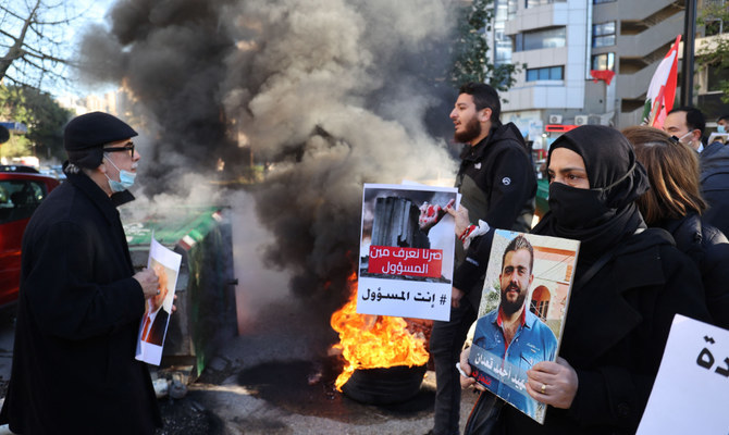 Families of Beirut port blast victims stage mass sit-in