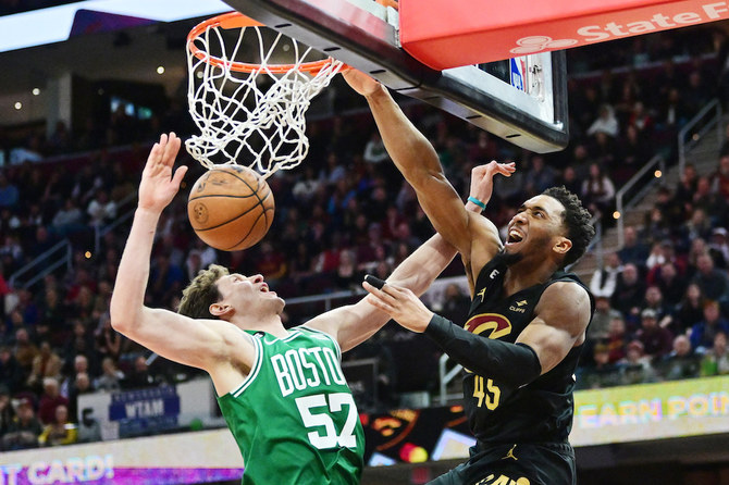 Cavs hand Celtics third straight defeat in overtime, Sixers roll on