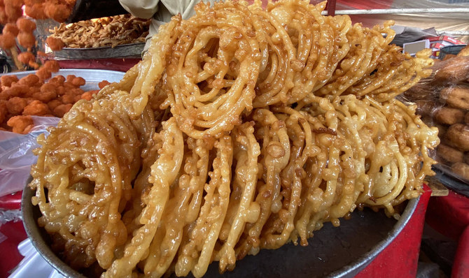 Sales at the Afghan Jalebi Wala stall at board bazar generally increase during the winter and, especially, ramadan. (AN photo)