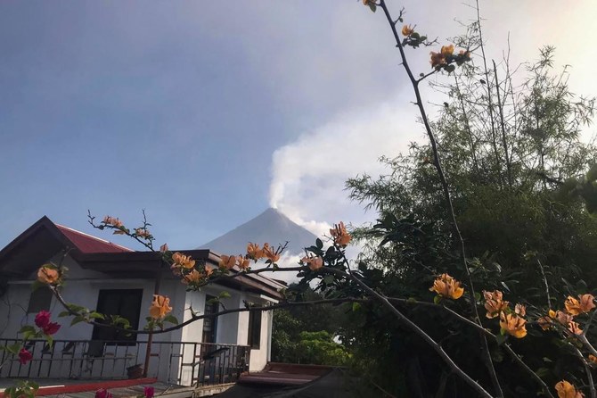 Philippines on alert as Mayon volcano spews ash