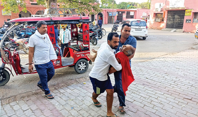 India struggles with a sweltering heat wave in 2 populous states