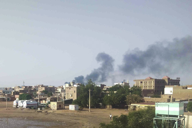 Smoke rises over Khartoum on Friday as clashes between warring factions resumed in Sudan’s capital. (AP)